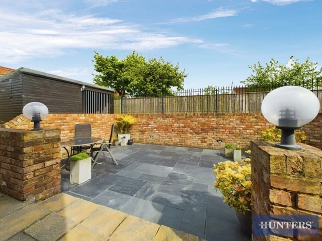 The walled garden area to the rear is ideal for sitting out in the summer.