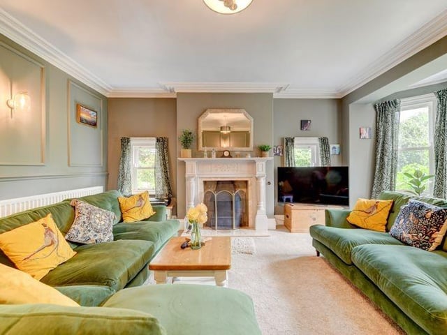 There is also a children playroom which was once a formal dining room, snug, w.c and a formal lounge with decorative wooden panelling to the walls.
