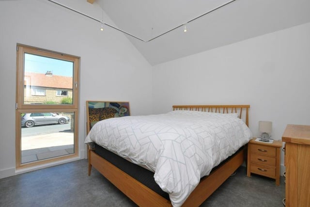 The bedroom in the extension has an en suite shower room, and is a fourth bedroom in the property.