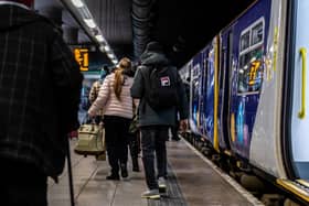 Passengers boarding a Northern train.
