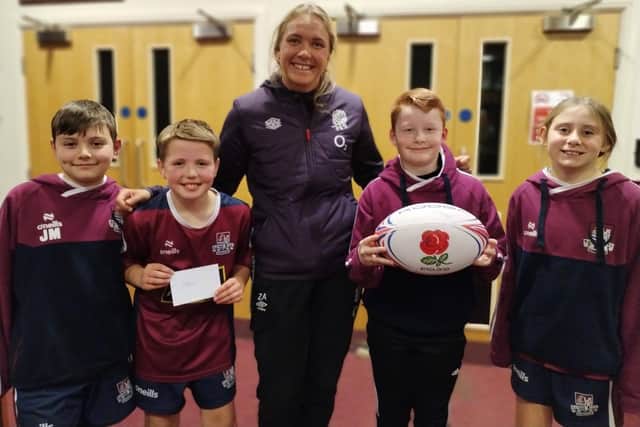 New Red Roses captain Zoe Aldcroft pictured with local youngsters at a training session last year