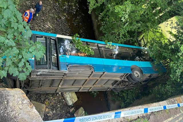 The aftermath of the crash on August 3 at Grosmont Bridge, where a bus plunged into the river.