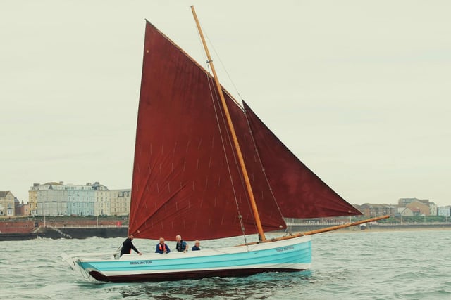 Three Brothers under full sail in the Bay.