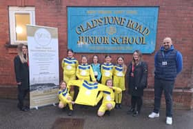 Karolina Manalastas and Rebecca Cooper, Co-Owners of Yorkshire Coast Recruitment, with Mr Philps (Sports Coach/Senior Learning Mentor) and the girls football team.