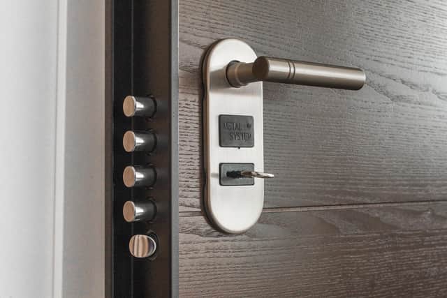 Upgrading security on your new home is a worthwhile way to spend money saved.