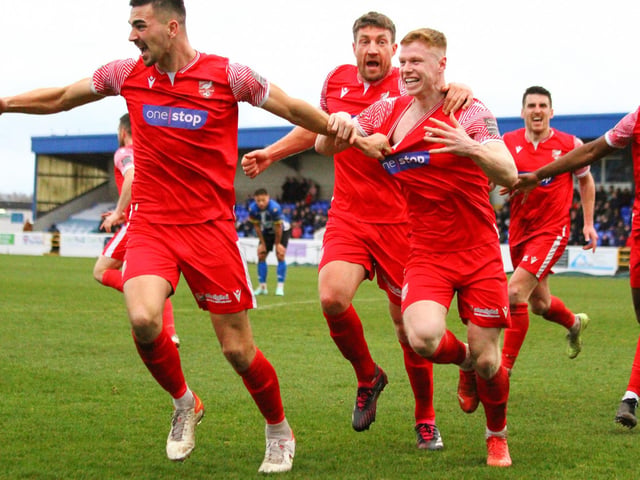 Will Thornton, left, leads the celebrations after his dramatic equaliser in injury-time at Chester.