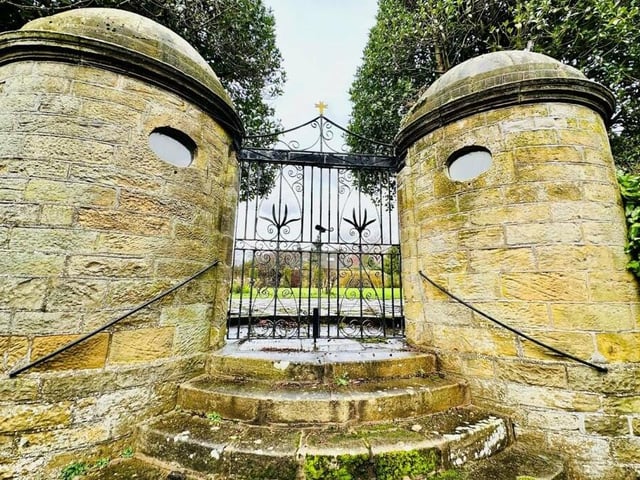 The Grade ll listed 'pepper pot ' gate piers in dressed sandstone are at either side of the garden gates. According to legend, bread was handed to the poor through the circular windows of the two round gatehouses. They were depicted in two paintings by John Atkinson Grimshaw in 1877.