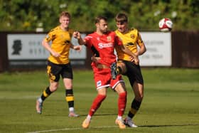 Lewis Dennison in action for Brid during the loss at Prescot
