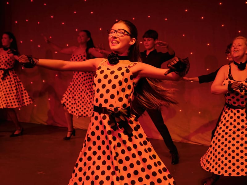 Colebrooke Productions' dancers entertain the crowd.