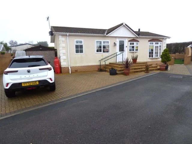This two bedroom and two bathroom mobile/park home is for sale with Holihomes with a guide price of £67,950.