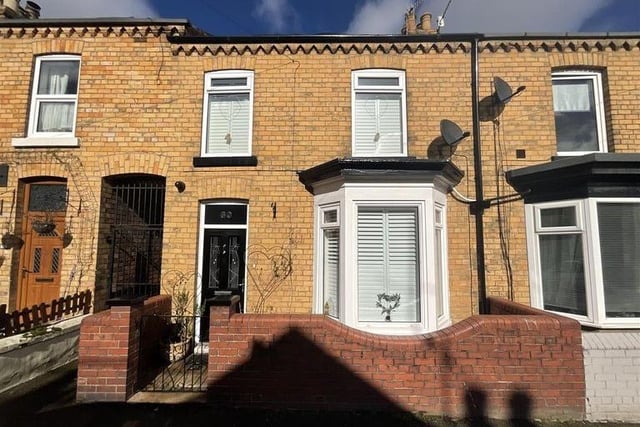 This two bedroom and one bathroom mid-terrace house is for sale with CPH Property Services with offers over £130,000