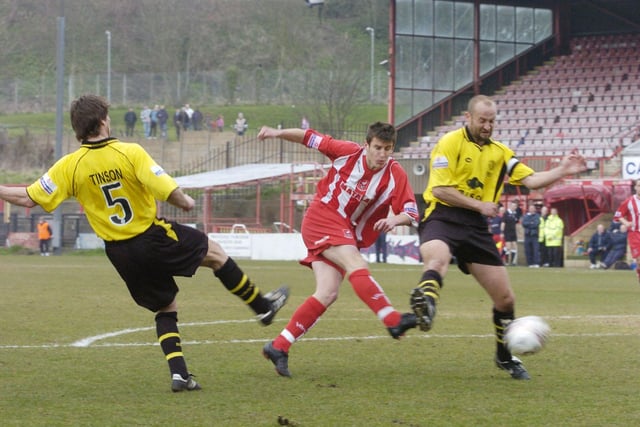 Do you recognise this Scarborough FC player in action against Burton Albion?.