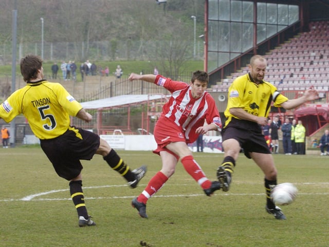 Do you recognise this Scarborough FC player in action against Burton Albion?.
