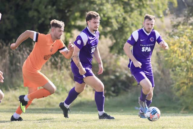 Edgehill, orange kit, won 3-2 at Brid Spa. Photo by TCF Photography