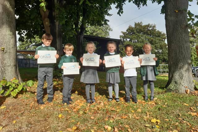 Airy Hill School youngsters celebrate the school's 'Good' Ofsted rating.