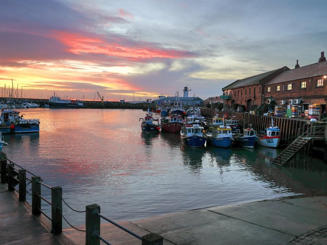 Scarborough harbour at dawn.