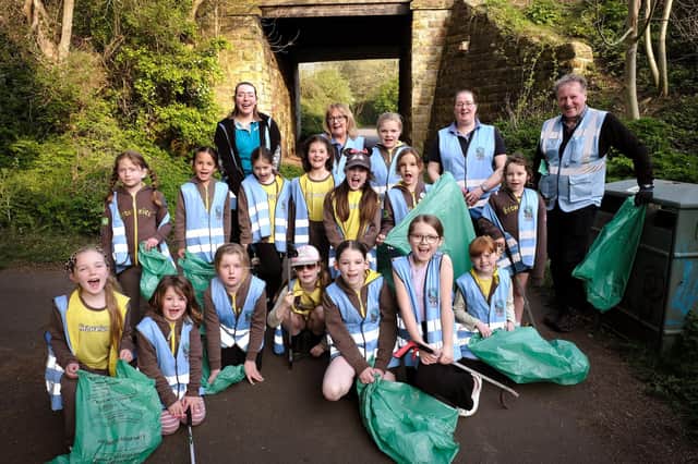 Scarborough Brownies take part in a litter pic on the Cinder Track with Mick Couzens