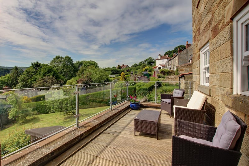 The balcony with panoramic vista is accessed from the first floor lounge.