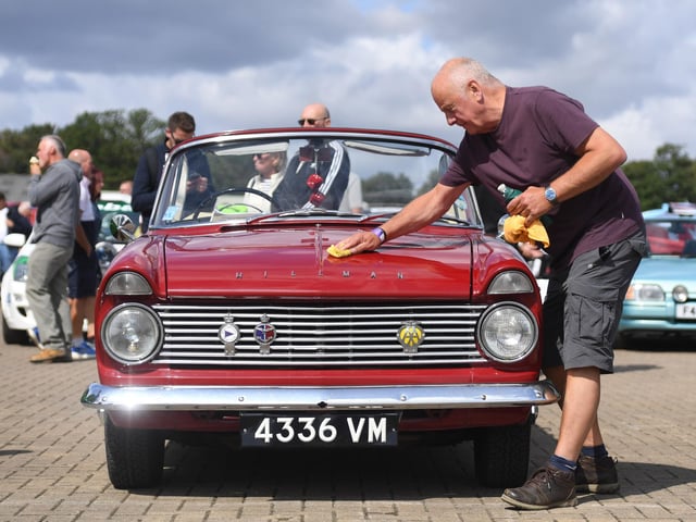Pictured polishing the car ready for showing.