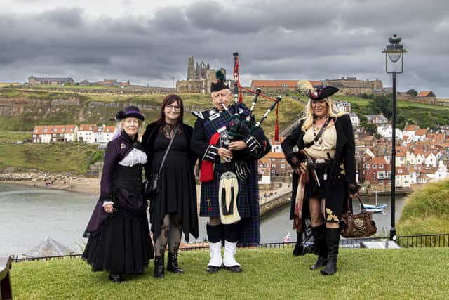 Steampunks - and a bagpiper - on Whitby West Cliff.
picture: Ian Carr.
