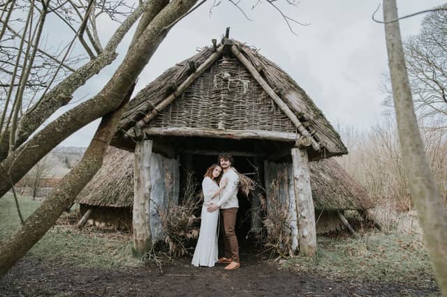 Couple outside Ryedale Folk Museum's roundhouse