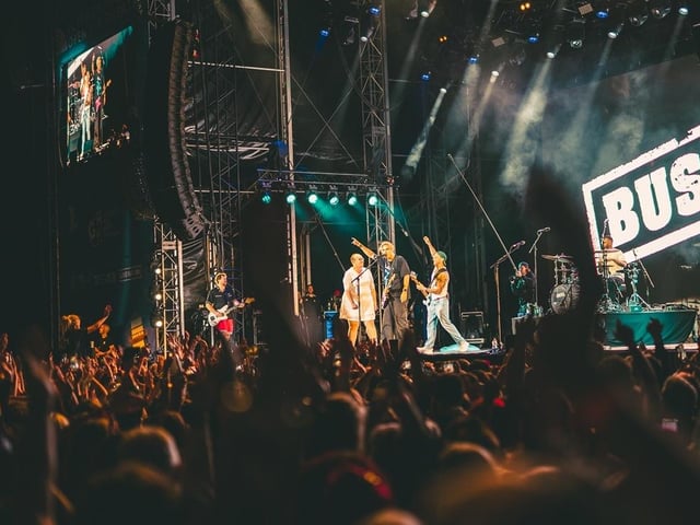 Busted superfan Jan joins the group on stage at Scarborough.