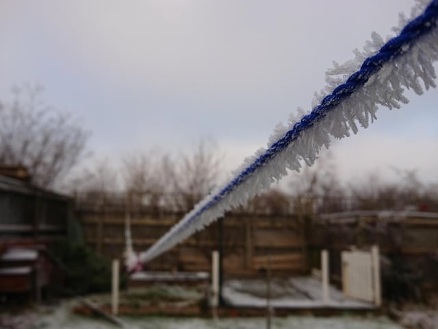 ice on a washing line in Bridlington, by Robert Hudson.