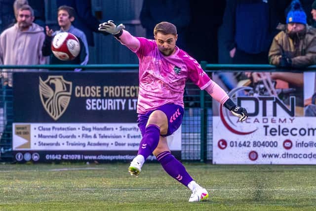 Whitby Town keeper Shane Bland clears the ball at Stockton. Photo by Brian Murfield