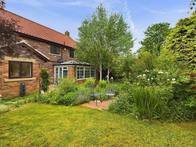 The house has a showcase garden.