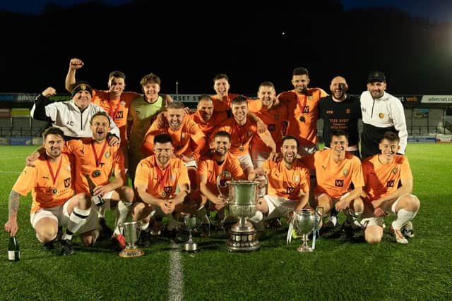 Edgehill celebrate their League Trophy final success.