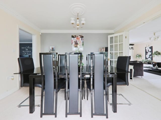 Dining space with room for a larger style suite.