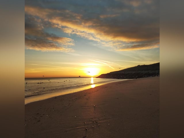 Scarborough beach scene, by Peter Robinson.