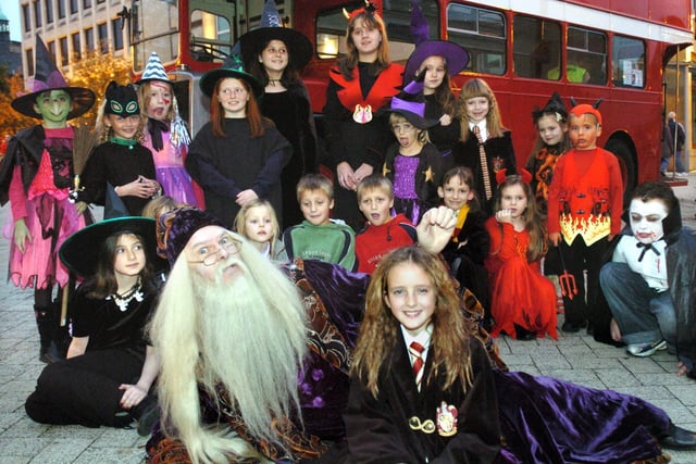 Star Comp winner Hannah Jenkins, with her pals arrives at the Fright Night with 'Dumbledore' on her special bus in 2004