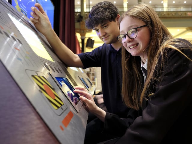Anglo American stand with Arnie Wright and a Caedmon pupil
