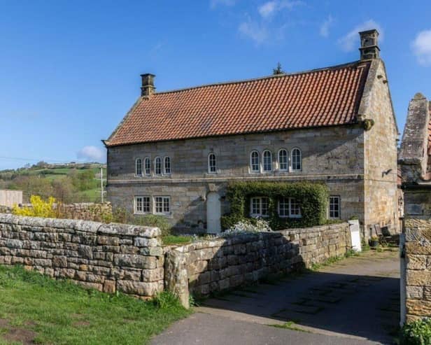 The front view of the stunning Grade ll-listed period farmhouse.
