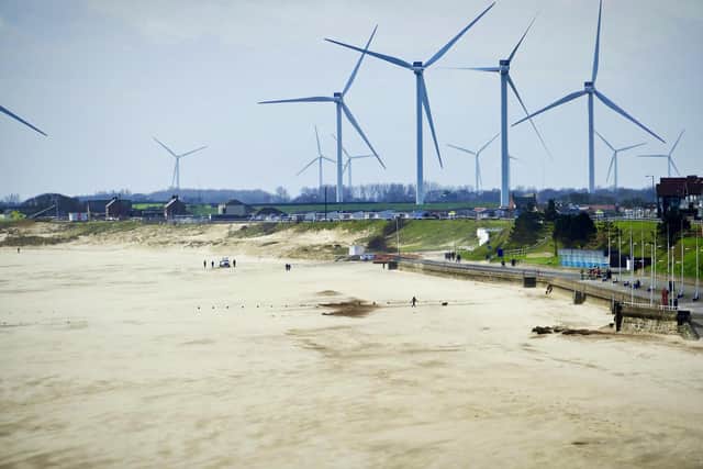 This image of the wind turbines near south beach is by Aled Jones.