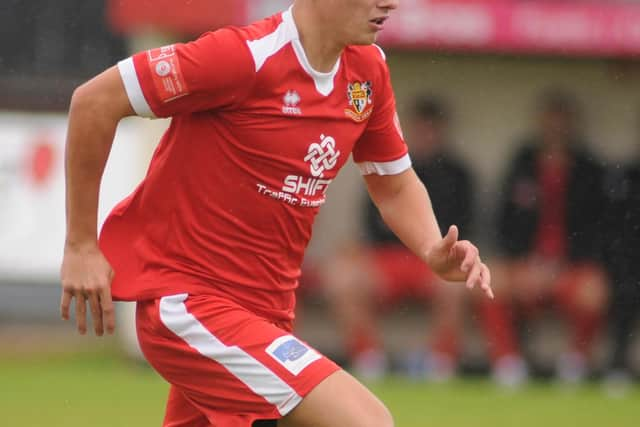 New signing Alex Markham in action Brid against Maltby.