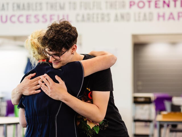 A hug of relief and excitement!