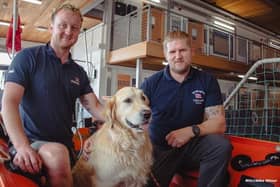 Amos returns to say 'thank you' with crew members AJ Shepherd (left) and Jason Stephenson (right). Photo: RNLI/Mike Milner