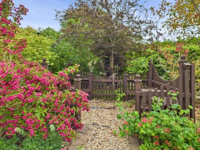 A scenic seating area in the garden.