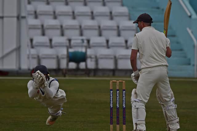 Valley keeper Charlie Ionascu reacts superbly to catch a James Denton reverse slog. Photo by Simon Dobson