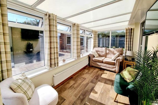 The conservatory adds another pleasant space to the property.