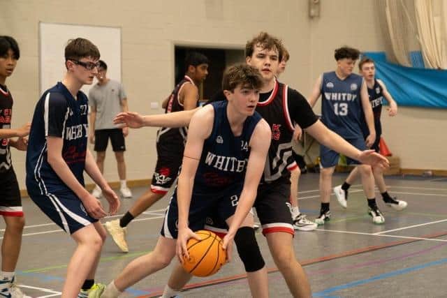 Whitby Jets' Angus Taylor up against Milo Metcalfe from York Eagles. Photo by elanabellephotography