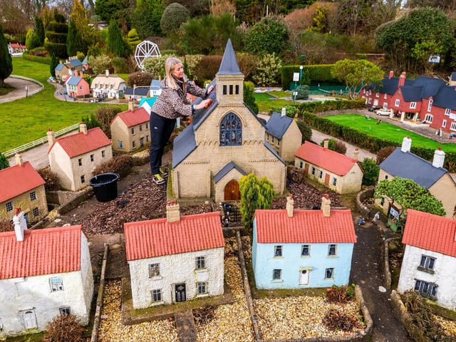 Bondville's Rachel Hill gives the church a spring clean.