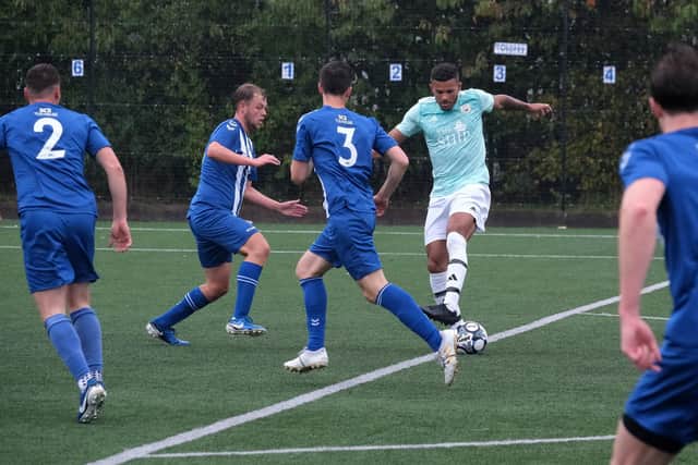Lloyd Henderson on the ball for Edgehill against North Cave. Photo by Richard Ponter