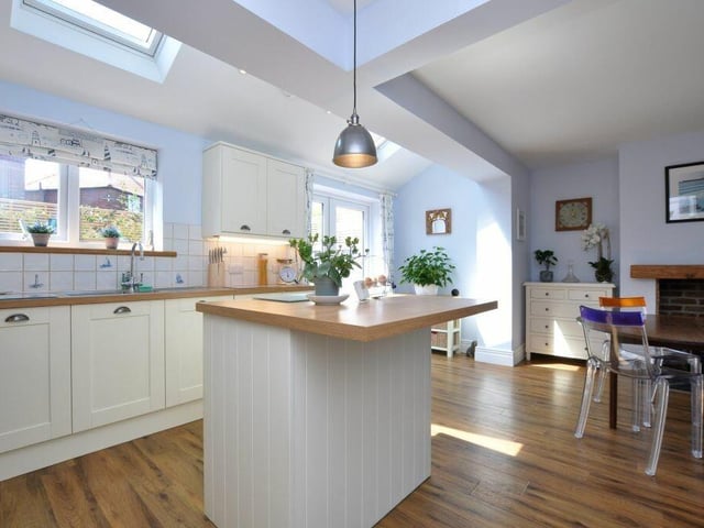 The bright and open kitchen with central island.