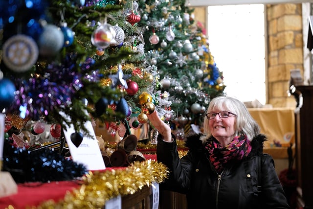 Visitor Margaret Clarke enjoys the festive trees.
picture: Richard Ponter, 225201d