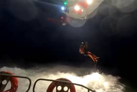 This video shows the thrilling moment a member of the Coastguard was lowered by a helicopter in the dark to land on a Bridlington lifeboat. Photo and video courtesy of Bridlington RNLI.