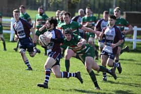 Scarborough's Joe Davies looks to outpace a West Hartlepool player. PHOTOS BY PAUL TAIT