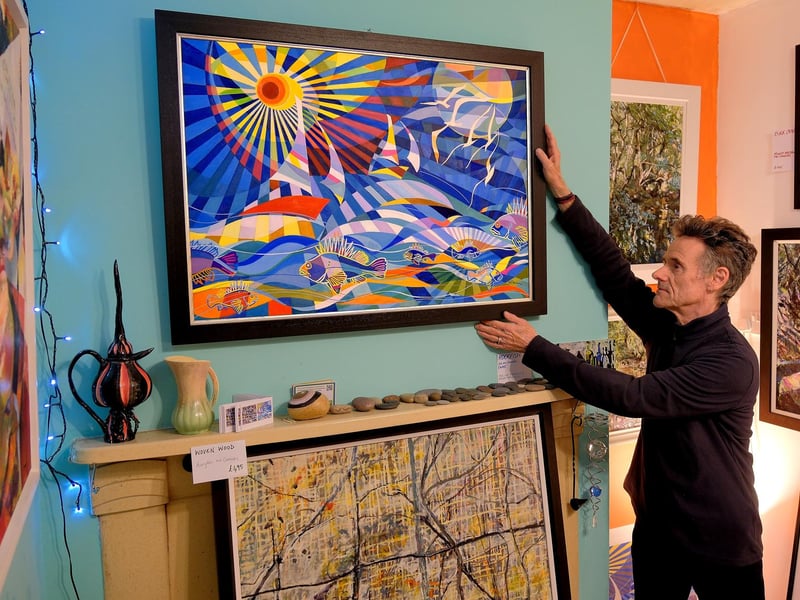 Simon Dawson arranging his work.
picture: Richard Ponter